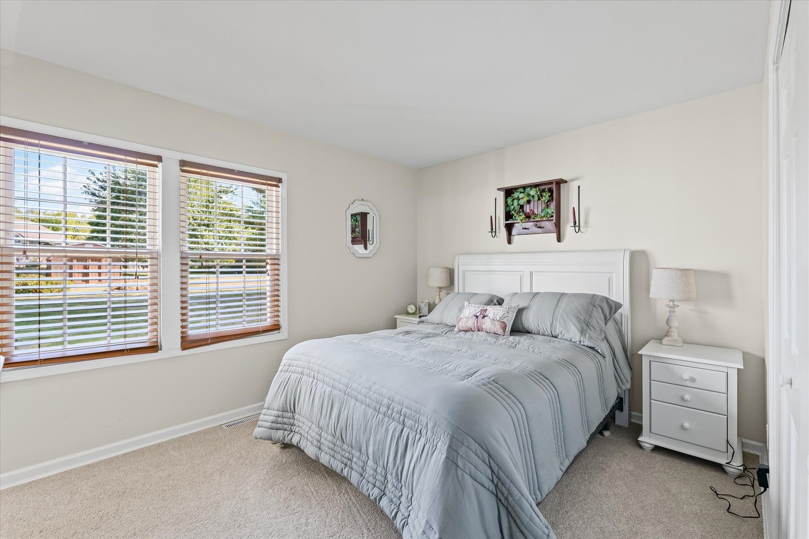 1106 South Spring Lake Road Mahomet, IL 61853 - Photo 14 of 36 a bedroom with a bed and a window