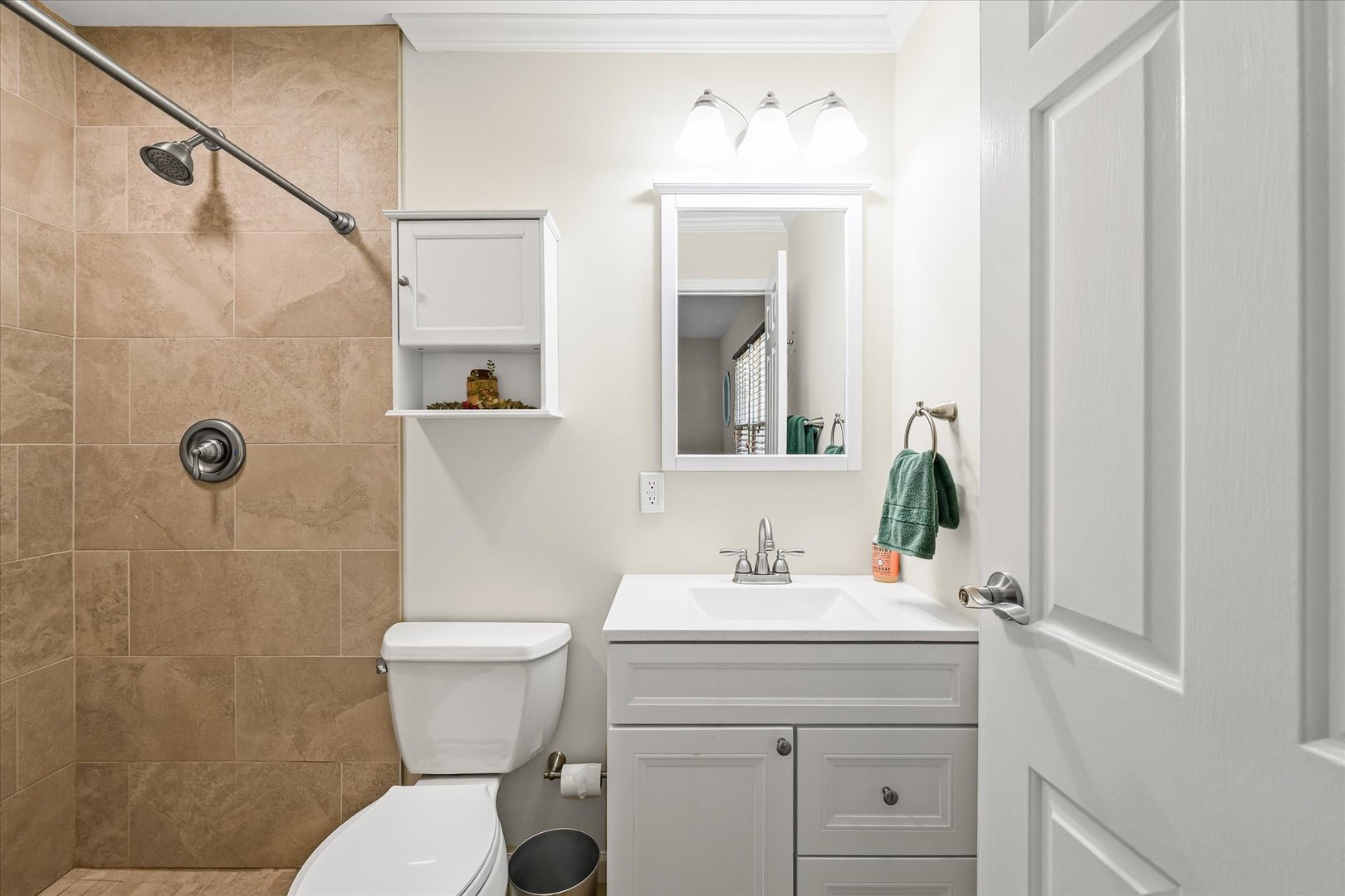 1106 South Spring Lake Road Mahomet, IL 61853 - Photo 16 of 36 a bathroom with a sink toilet and shower