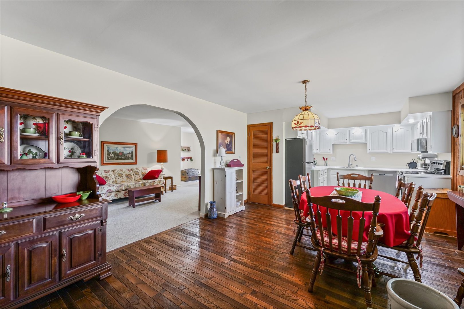 1106 South Spring Lake Road Mahomet, IL 61853 - Photo 19 of 36 a view of a dining room with furniture and wooden floor