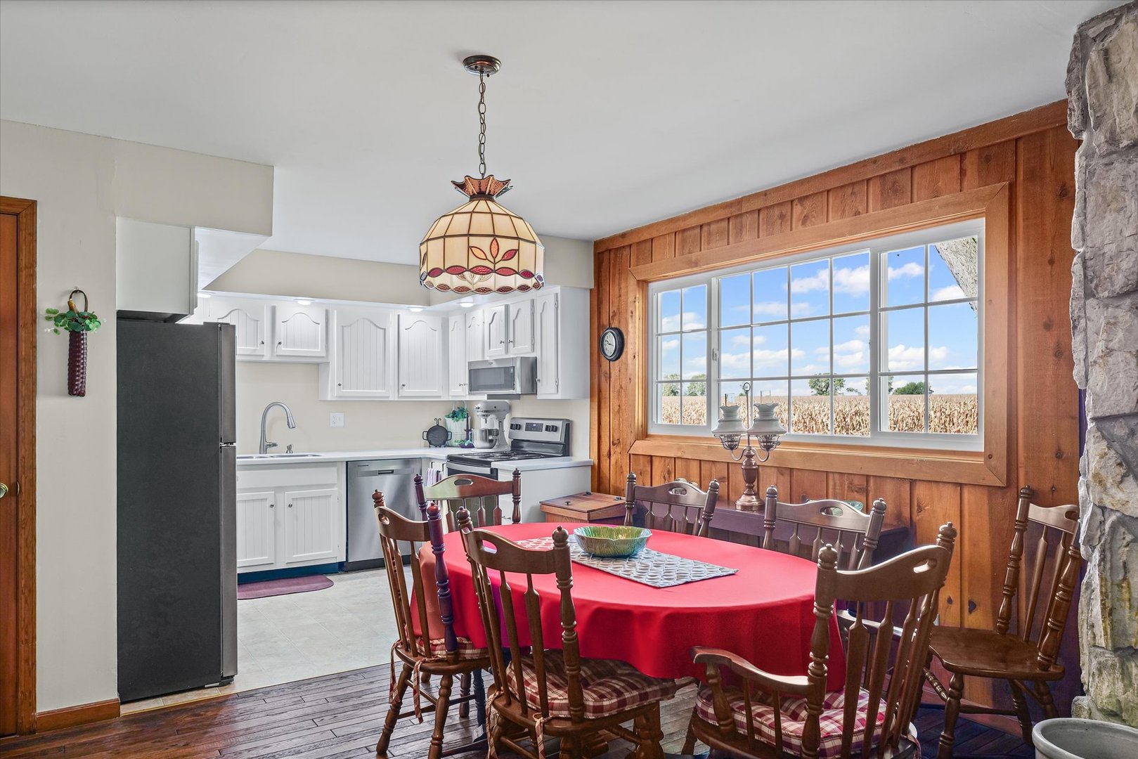 1106 South Spring Lake Road Mahomet, IL 61853 - Photo 20 of 36 a view of a dining room with furniture window and outside view