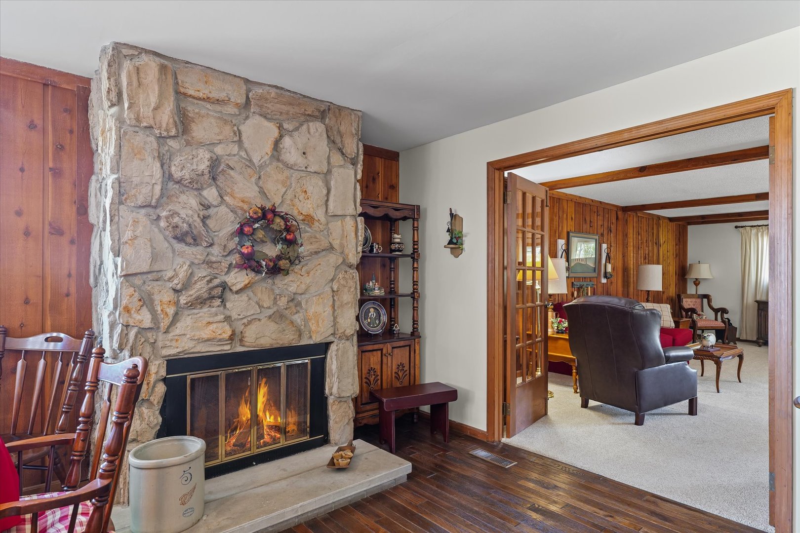 1106 South Spring Lake Road Mahomet, IL 61853 - Photo 22 of 36 a living room with furniture and a fireplace