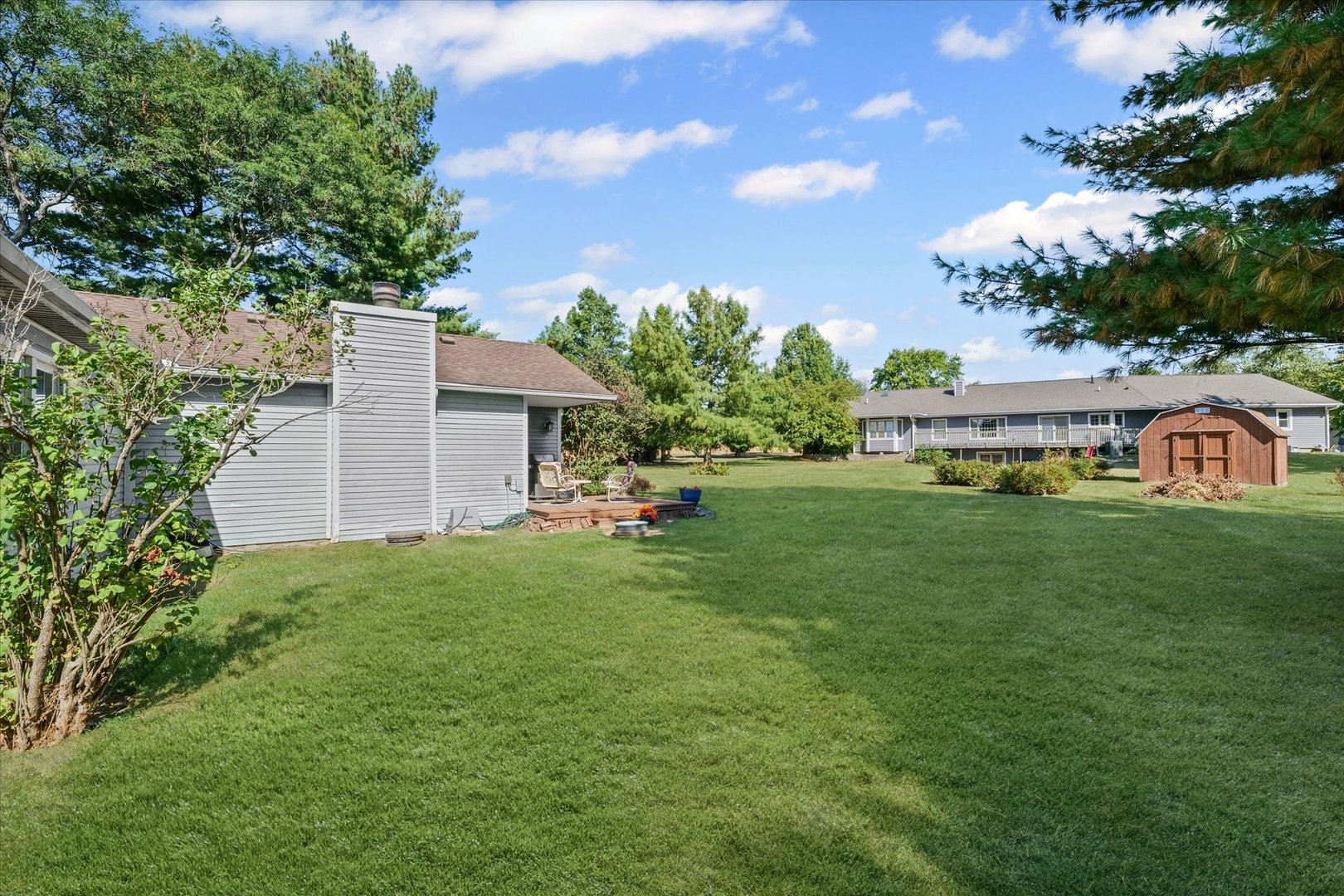 1106 South Spring Lake Road Mahomet, IL 61853 - Photo 31 of 36 a front view of a house with garden