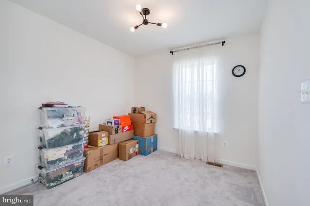 a bedroom with a bed and a closet