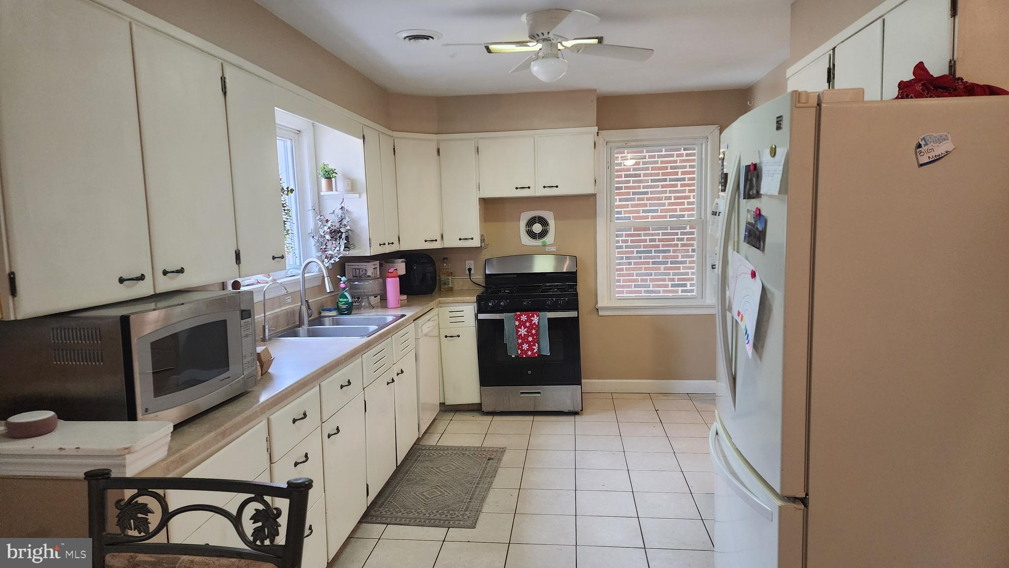 211 University Boulevard Glassboro, NJ 08028 - Photo 6 of 22 a kitchen with stainless steel appliances granite countertop a refrigerator and a sink