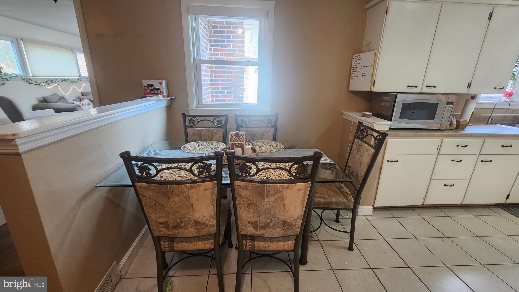 211 University Boulevard Glassboro, NJ 08028 - Photo 7 of 22 a view of a dining room with furniture and a window