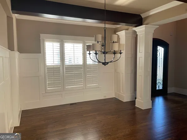 a view of a living room and kitchen floor