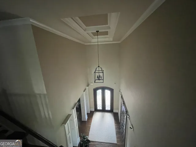 a view of a hallway with entryway