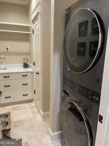 a utility room with dryer and washer