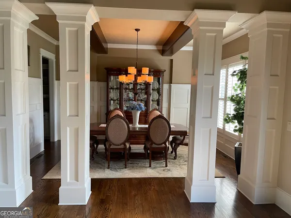 a view of a livingroom with furniture and wooden floor