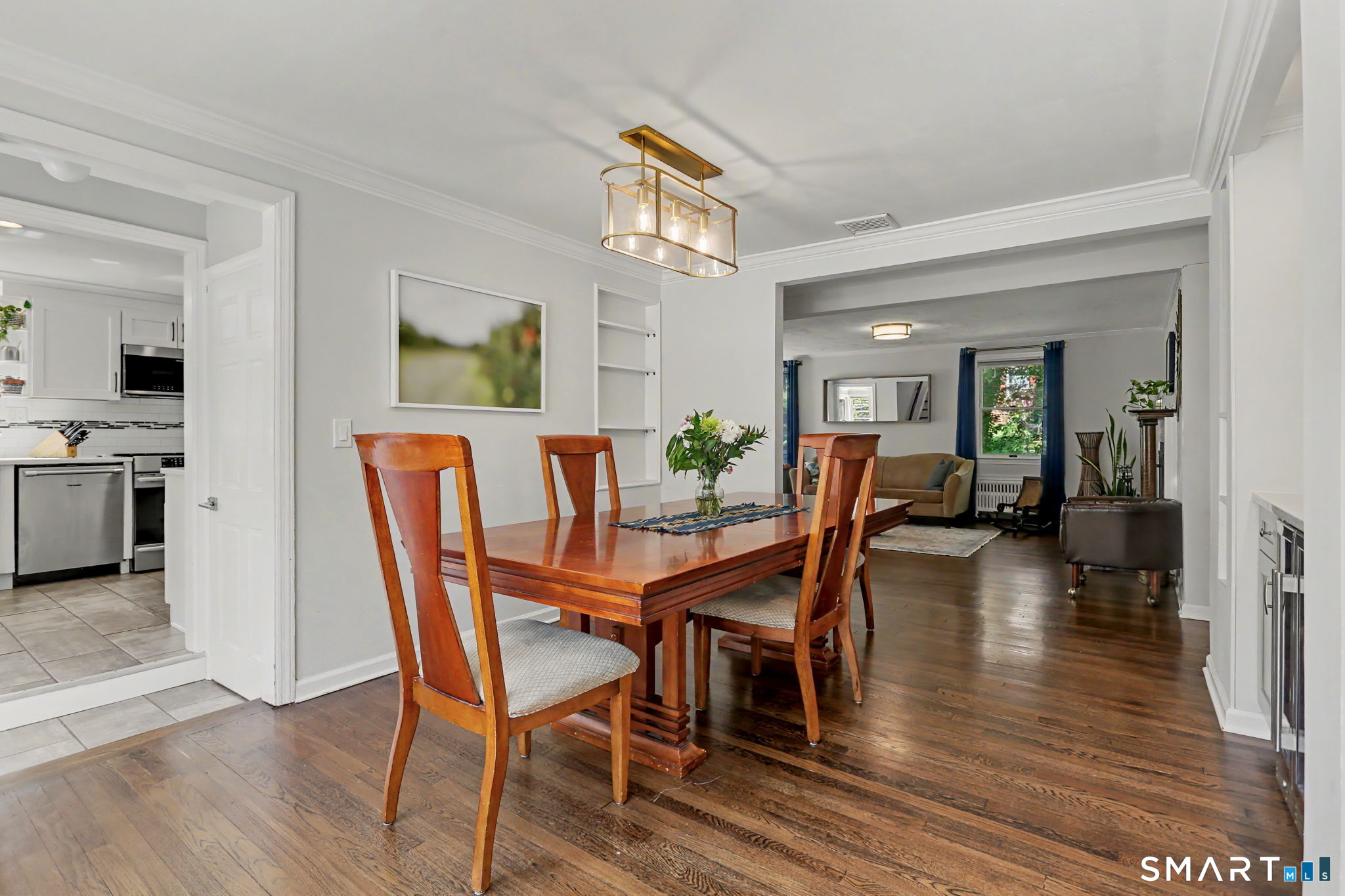 2 Rising Road Norwalk, CT 06850 - Photo 6 of 33 a dining room with furniture and wooden floor