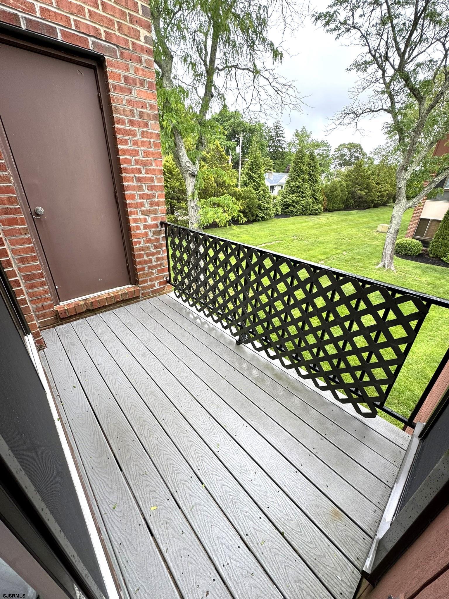 11 Shore Road, Unit 6C Somers Point, NJ 08244 - Photo 6 of 7 a view of a backyard