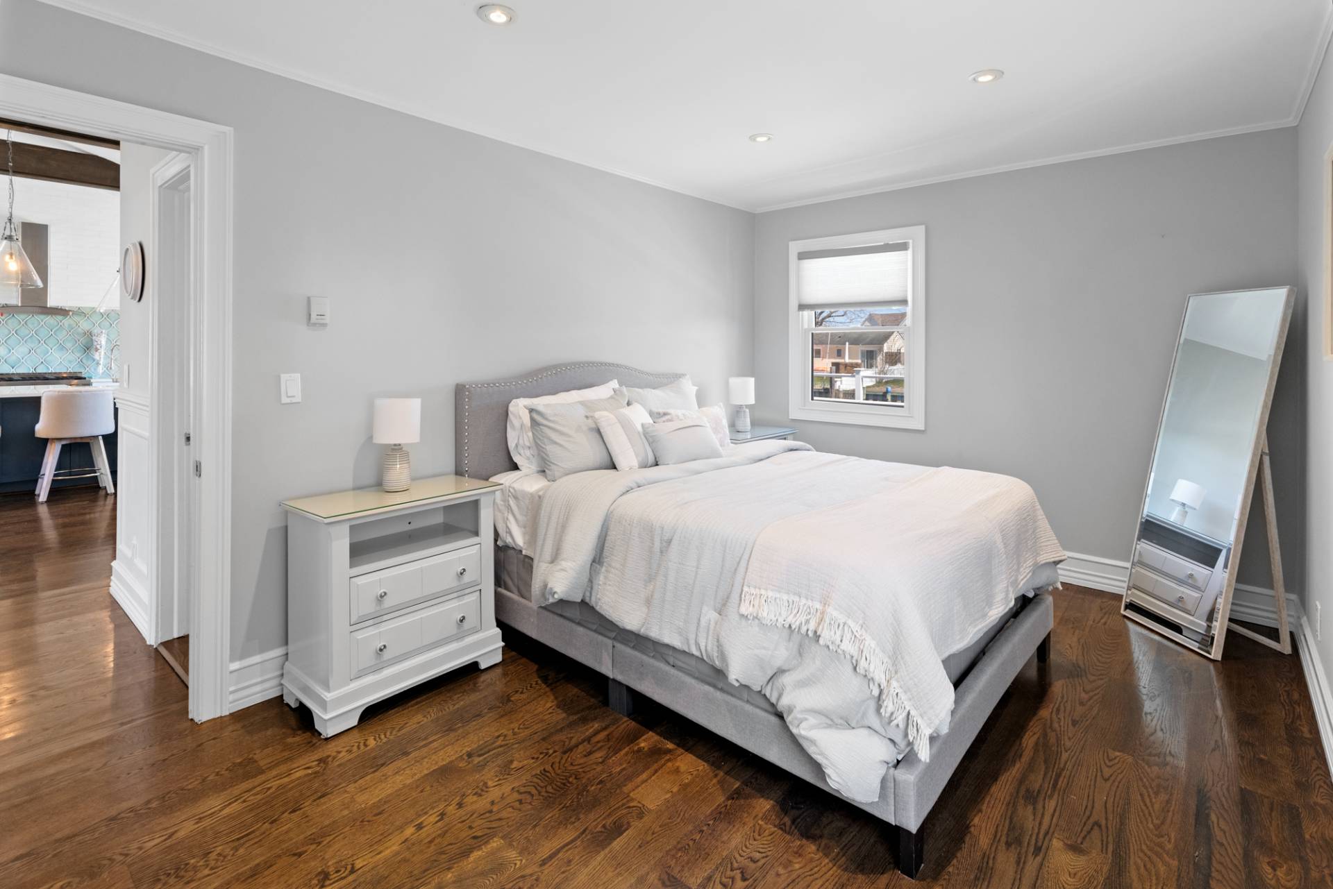 13 Marlin Road East Quogue, NY 11942 - Photo 17 of 22 a bed room with a bed and a chair