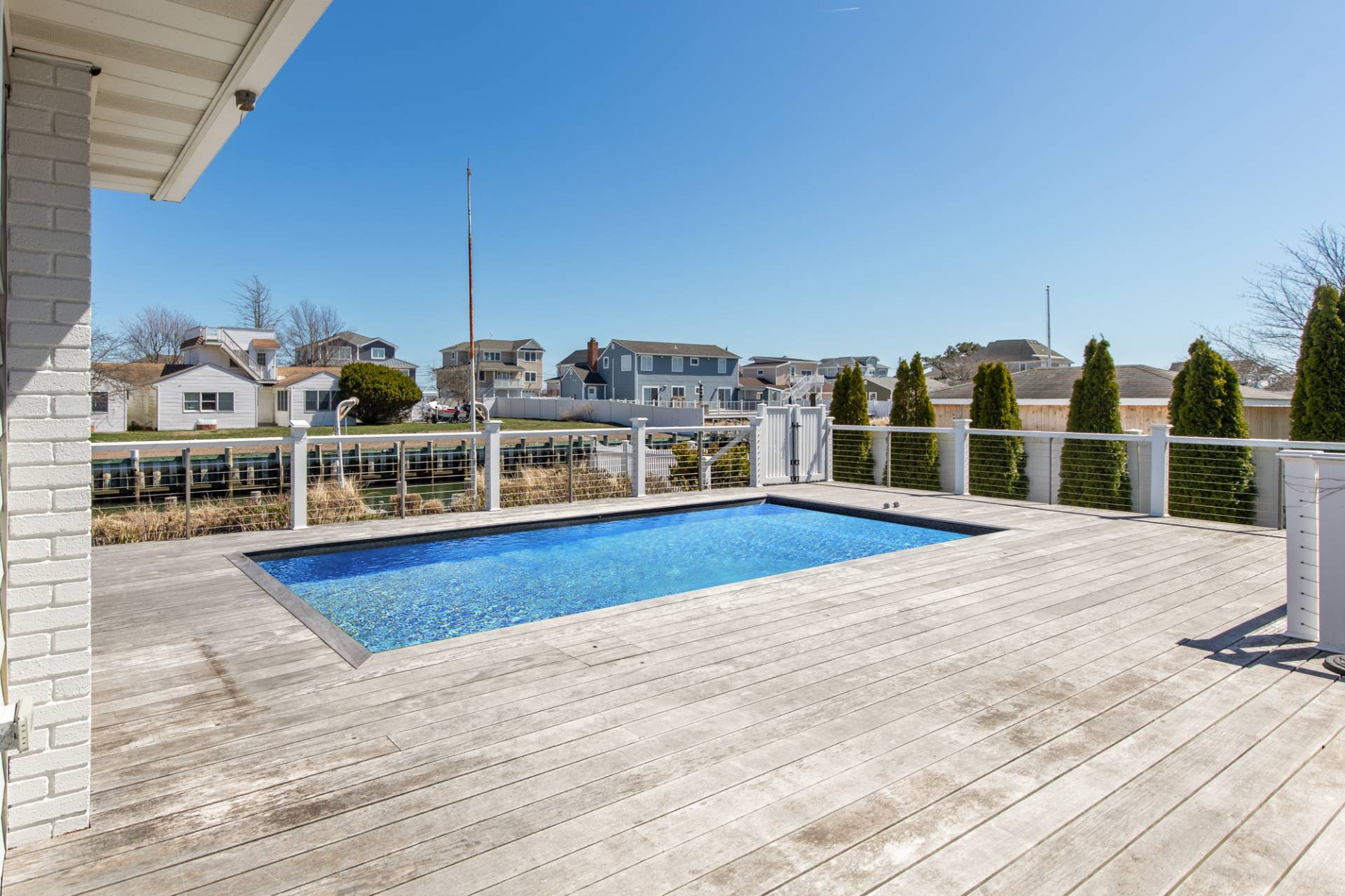 13 Marlin Road East Quogue, NY 11942 - Photo 18 of 22 a view of a balcony with city view