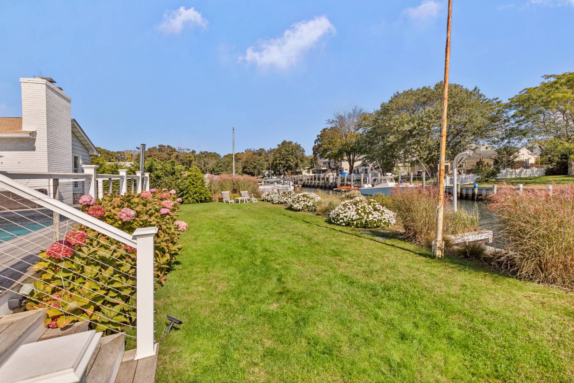 13 Marlin Road East Quogue, NY 11942 - Photo 20 of 22 a view of a city with tall buildings