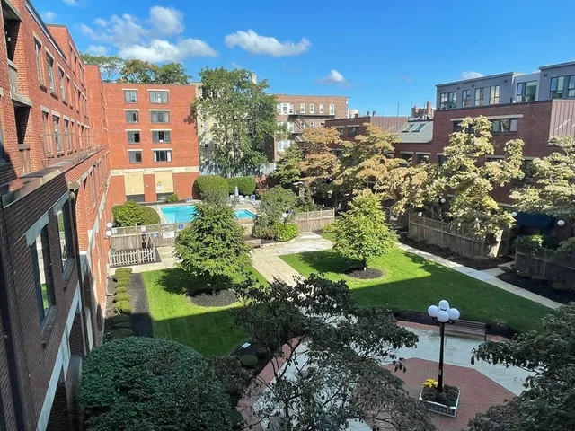 a view of a city with tall buildings
