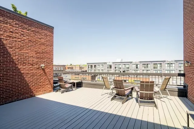 a view of roof deck with patio