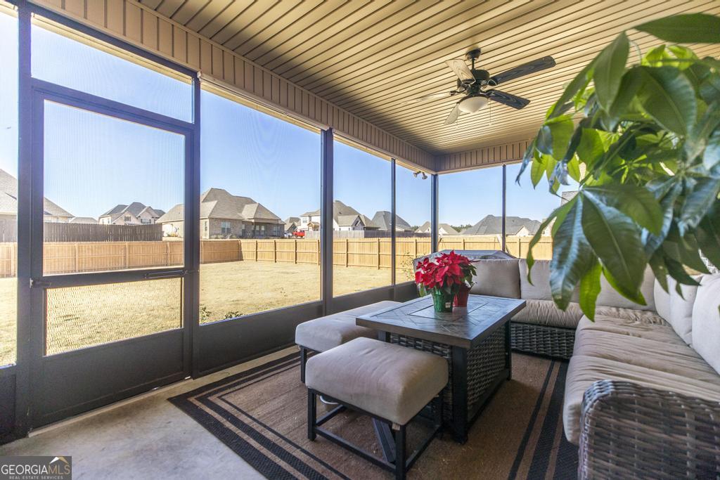 206 Bristleleaf Path Kathleen, GA 31047 - Photo 23 of 33 a living room with furniture and a potted plant