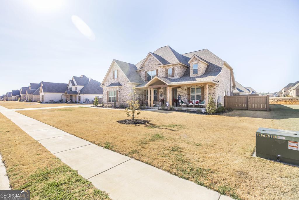 206 Bristleleaf Path Kathleen, GA 31047 - Photo 3 of 33 a view of a house with a swimming pool