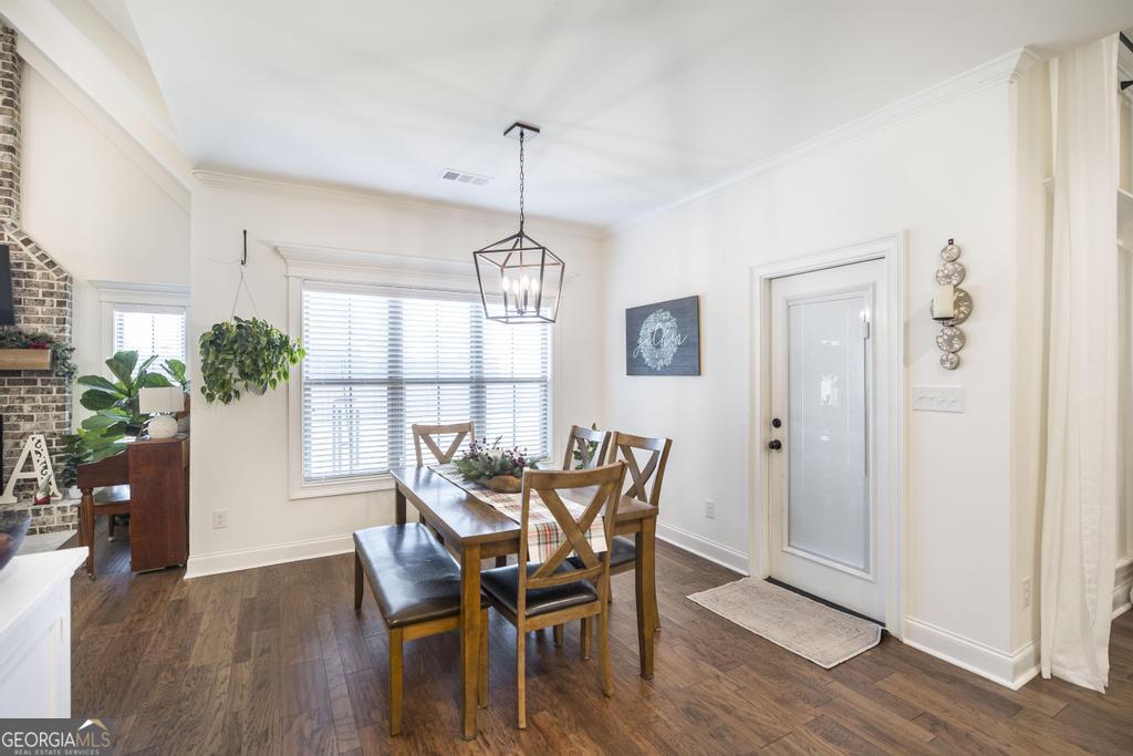 206 Bristleleaf Path Kathleen, GA 31047 - Photo 10 of 33 a view of a dining room with furniture window and wooden floor