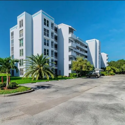 a view of a tall building in front of a building