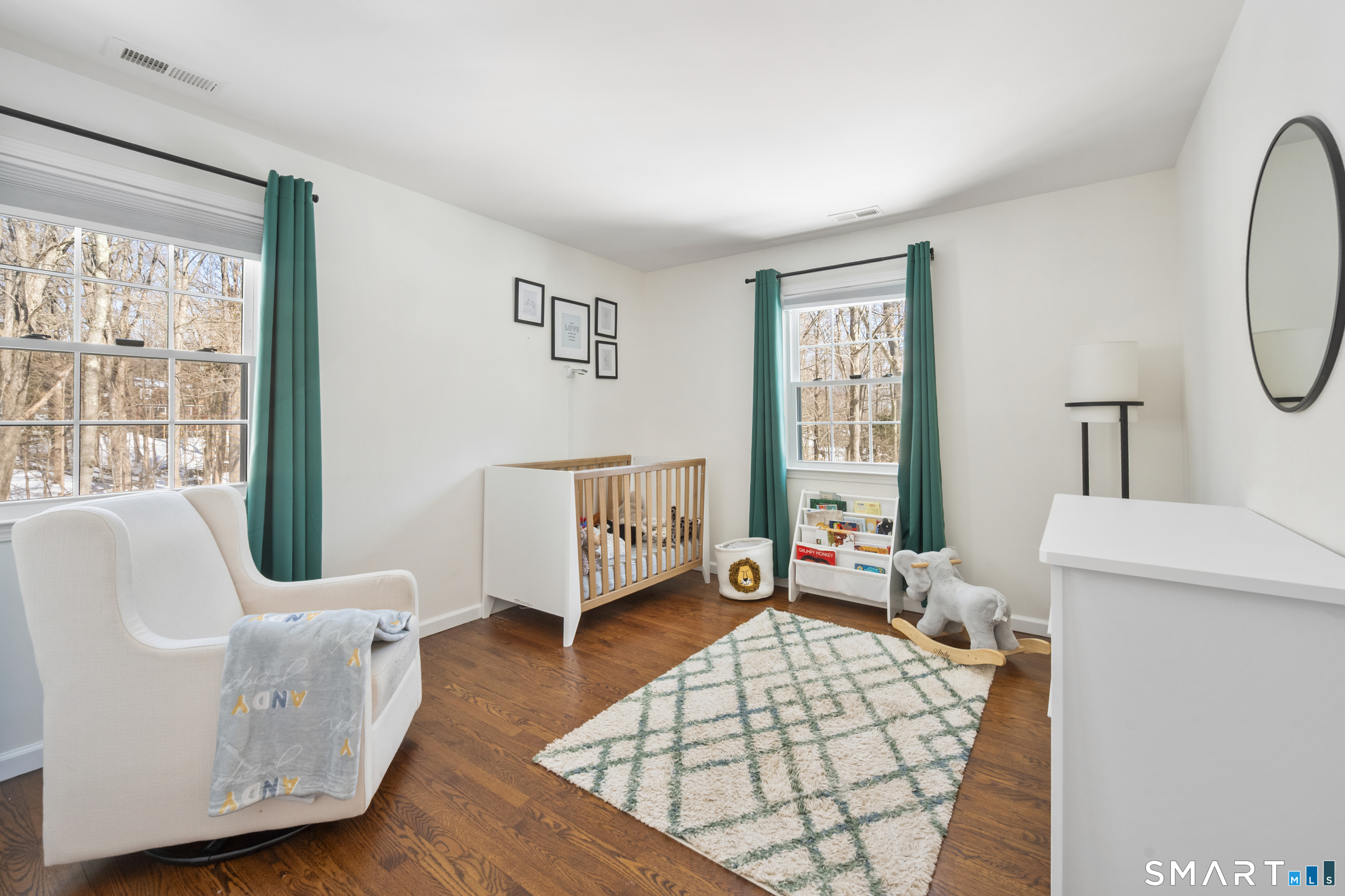6 Buckboard Lane Fairfield, CT 06824 - Photo 15 of 23 a living room with furniture and a large window