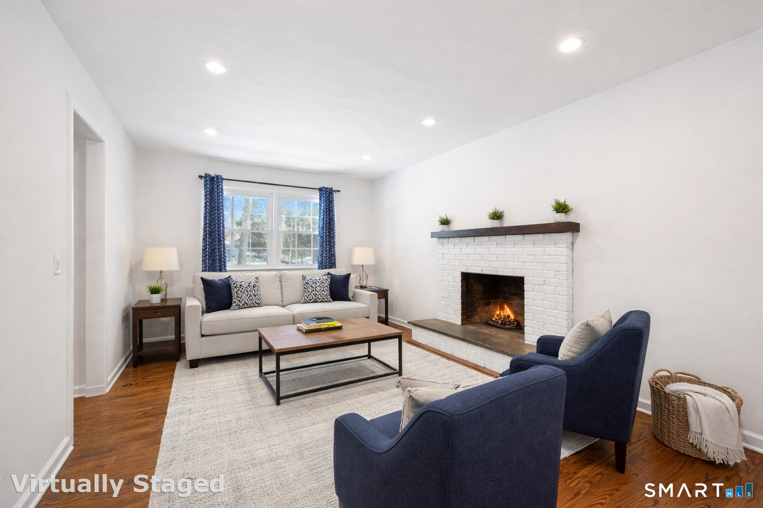 6 Buckboard Lane Fairfield, CT 06824 - Photo 9 of 23 a living room with furniture and a fireplace