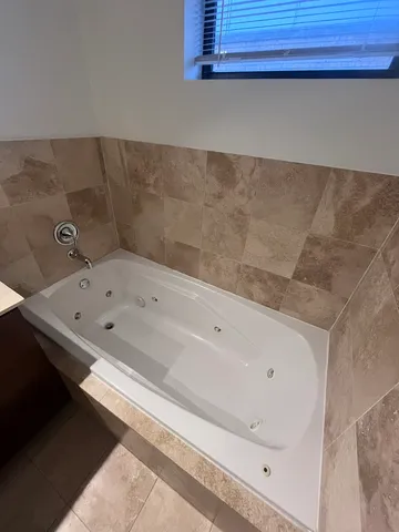 a view of multiple houses with outdoor space