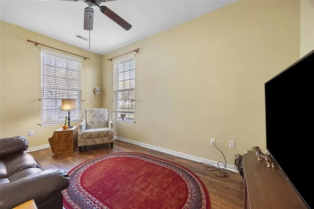 a bed room with a bed window and a couch