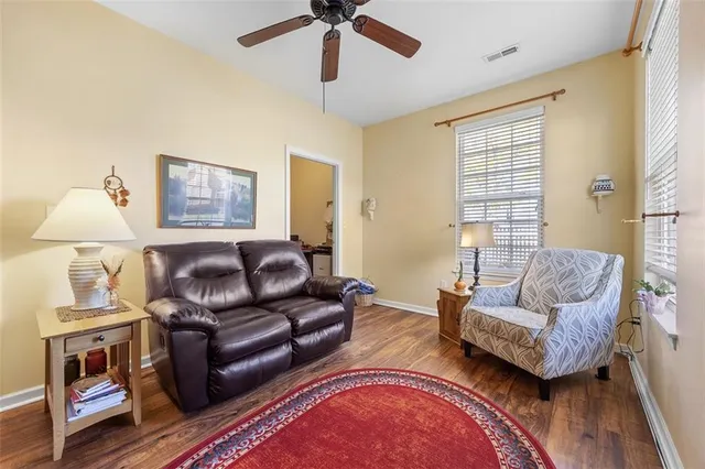 a living room with furniture and a window