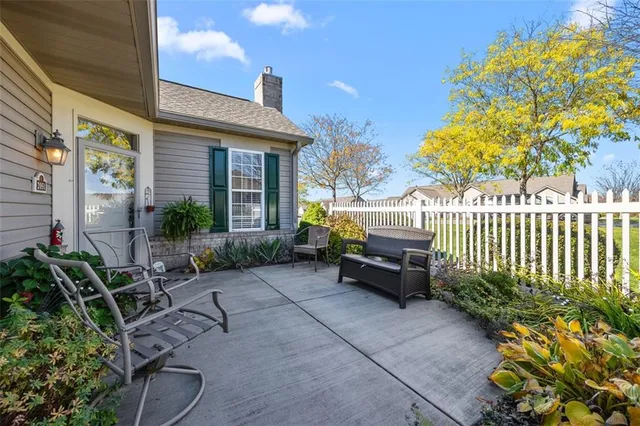 a garden view with a seating space