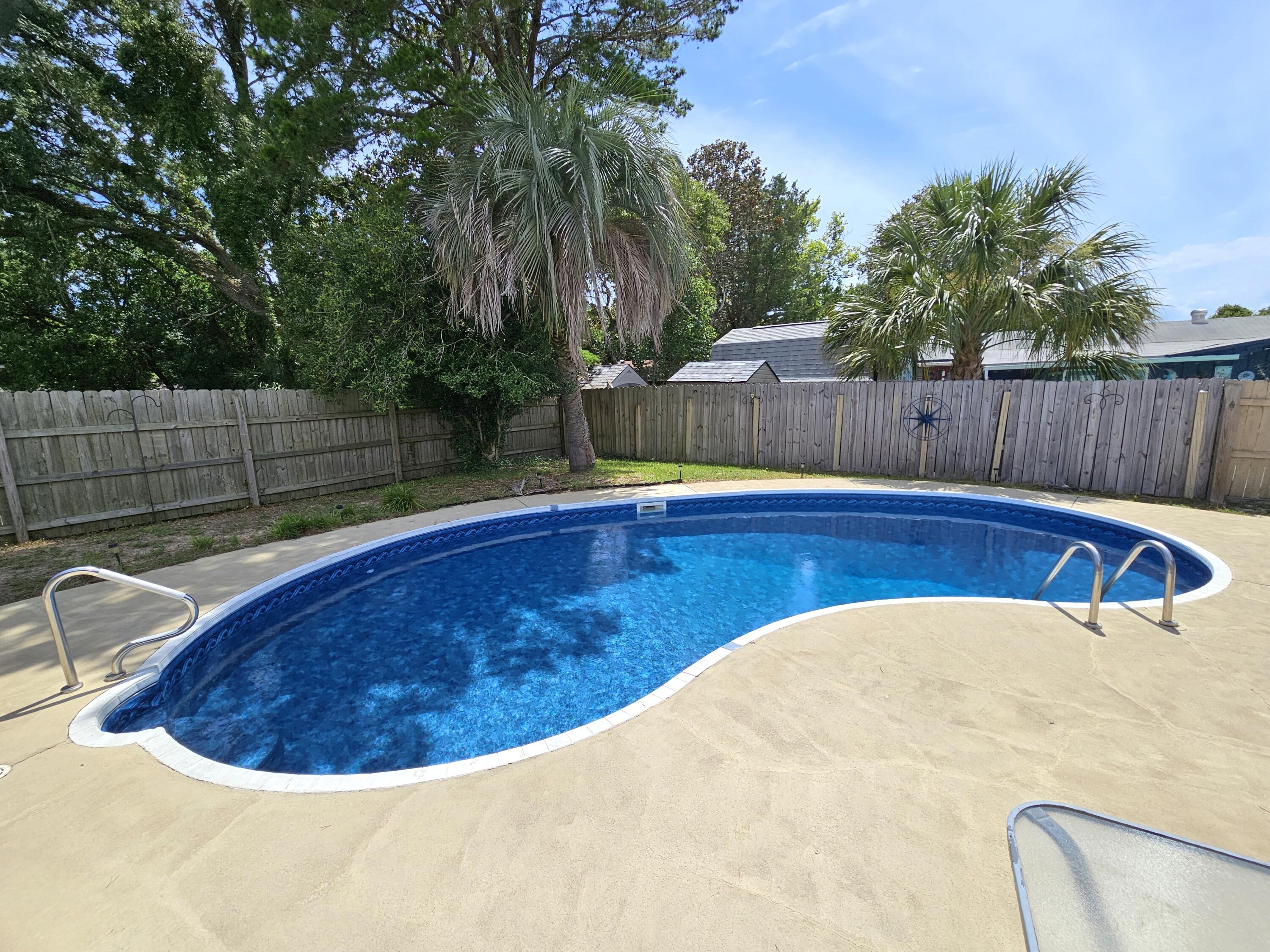 13 10th Street Shalimar, FL 32579 - Photo 1 of 17 a view of swimming pool