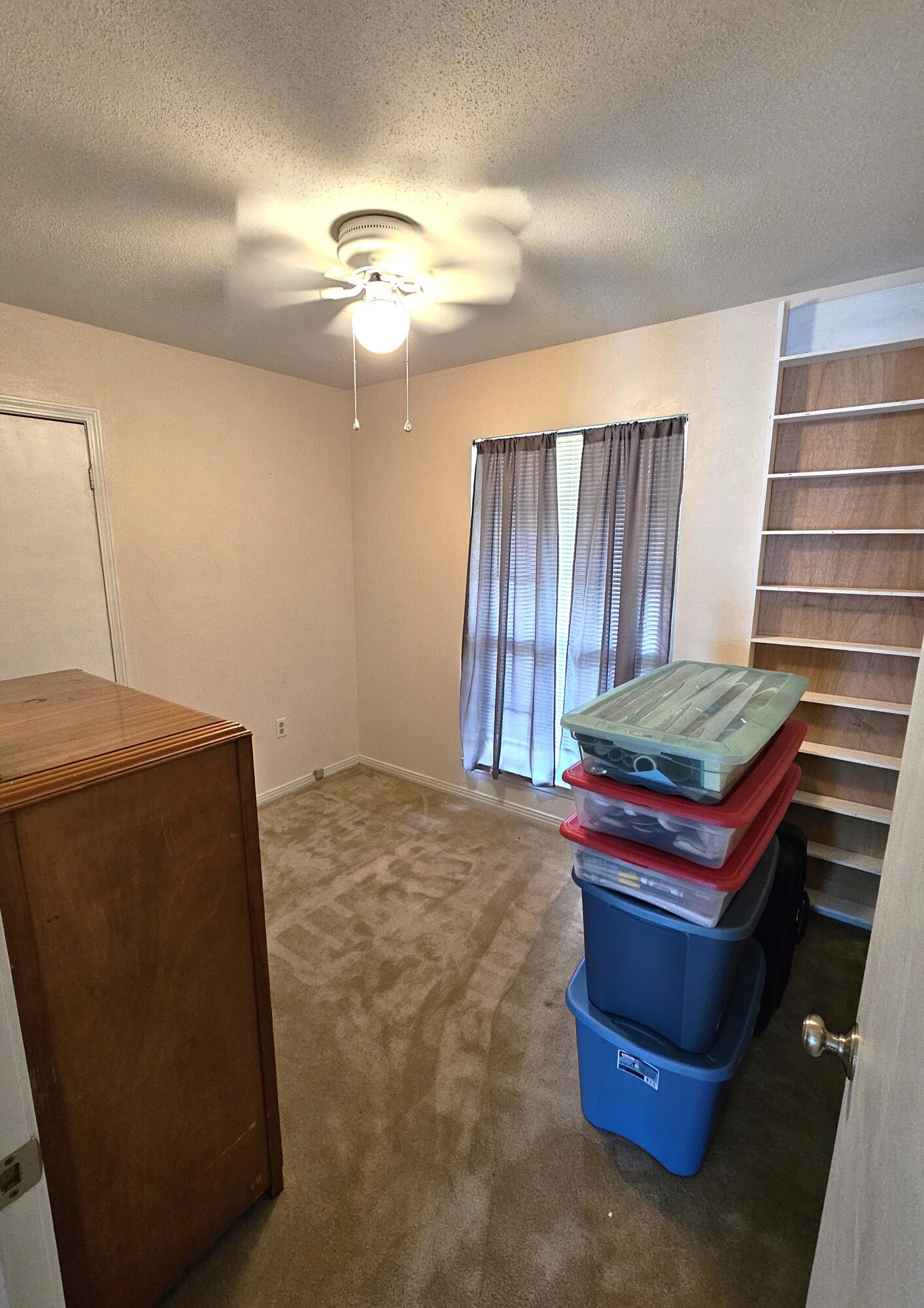 13 10th Street Shalimar, FL 32579 - Photo 14 of 17 a room with furniture and chandelier