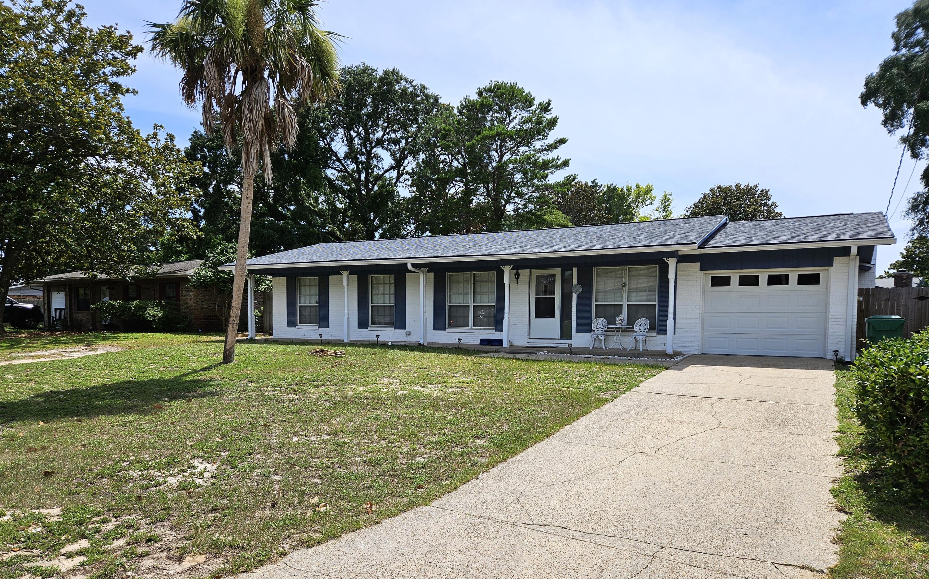 13 10th Street Shalimar, FL 32579 - Photo 3 of 17 front view of a house with a yard