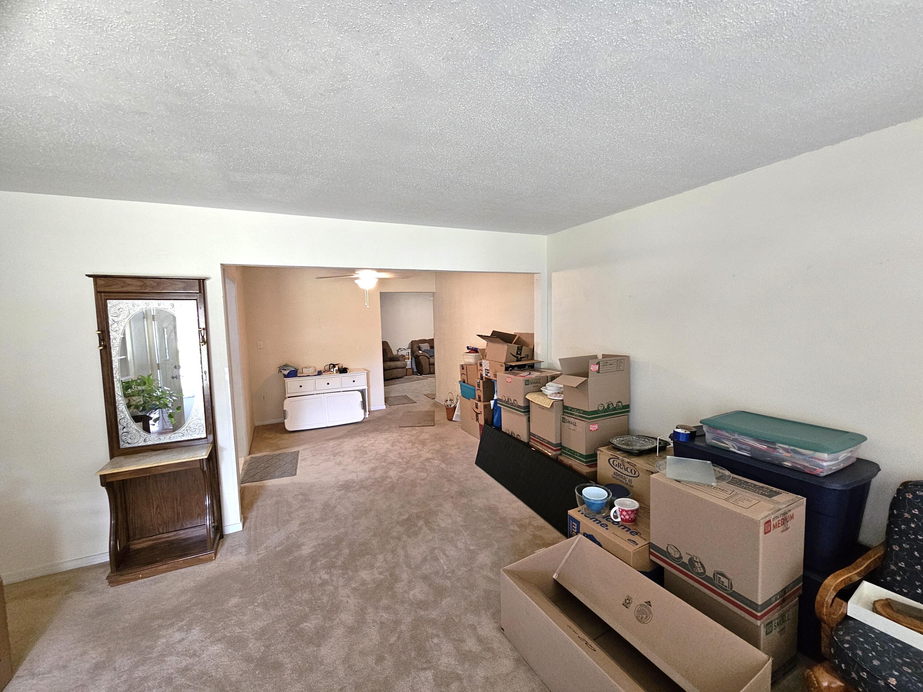 13 10th Street Shalimar, FL 32579 - Photo 4 of 17 a living room with furniture and a window