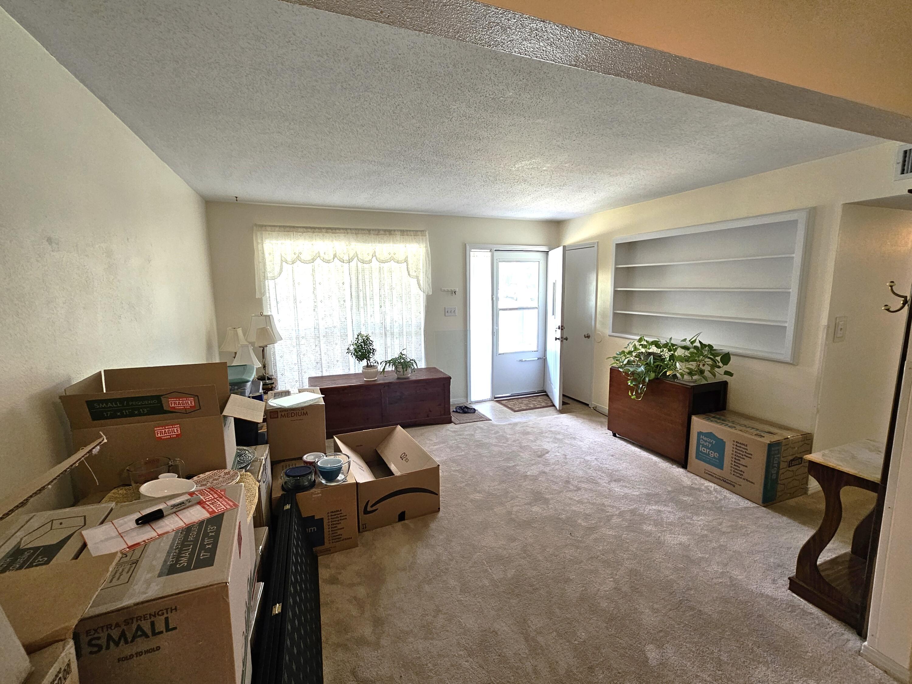 13 10th Street Shalimar, FL 32579 - Photo 5 of 17 a workspace with furniture and a window
