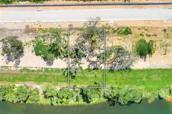 a view of a garden with a lake