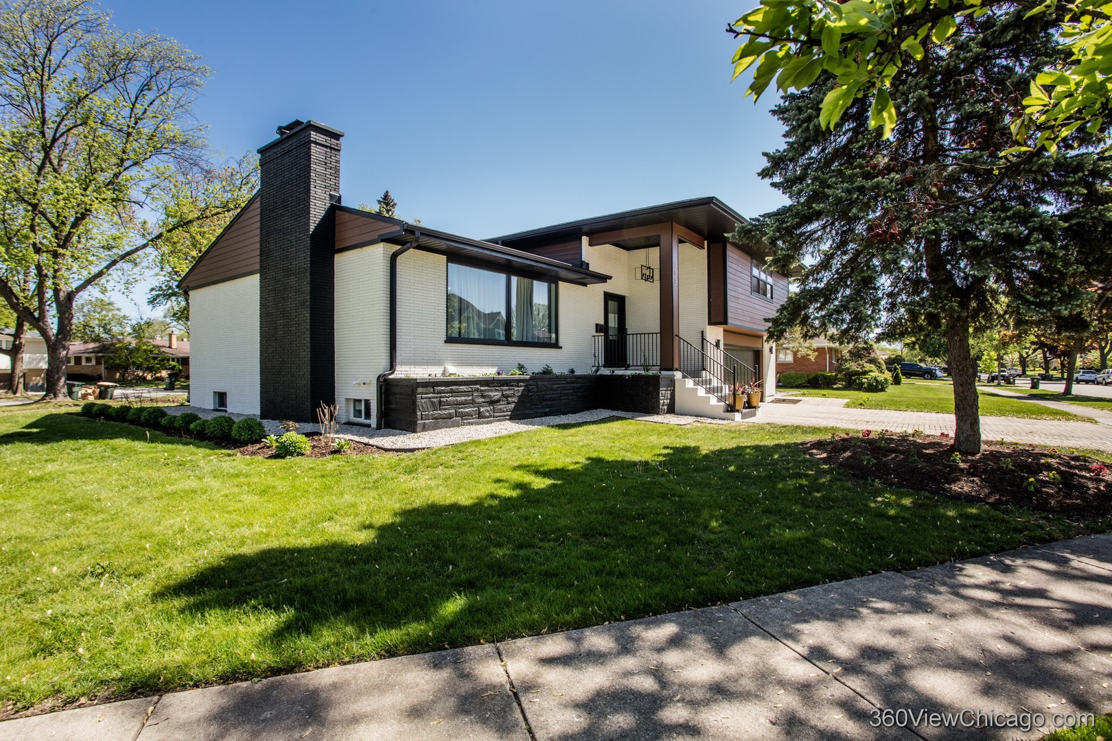 108 East Edgemont Lane Park Ridge, IL 60068 - Photo 2 of 11 a front view of house with yard