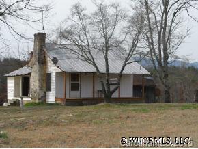 250 Tobacco Road Mill Spring, NC 28756 - Photo 2 of 7 a view of a house with a yard