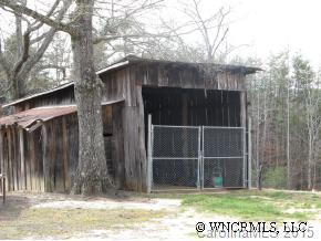 250 Tobacco Road Mill Spring, NC 28756 - Photo 4 of 7 a view of outdoor space with wooden fence