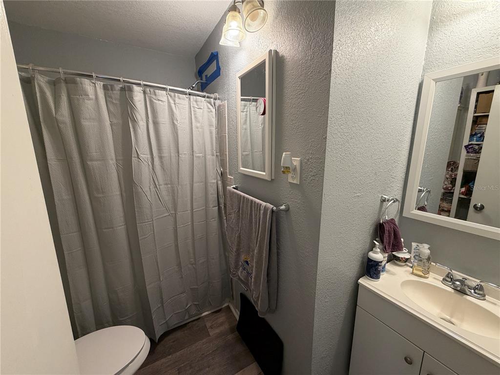 7016 Filbert Lane Temple Terrace, FL 33637 - Photo 15 of 31 a bathroom with sink toilet and shower