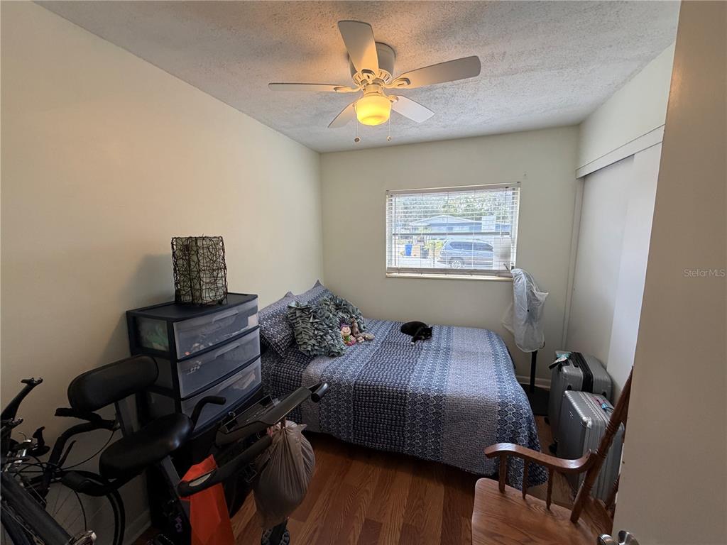 7016 Filbert Lane Temple Terrace, FL 33637 - Photo 18 of 31 a bedroom with bed and a window