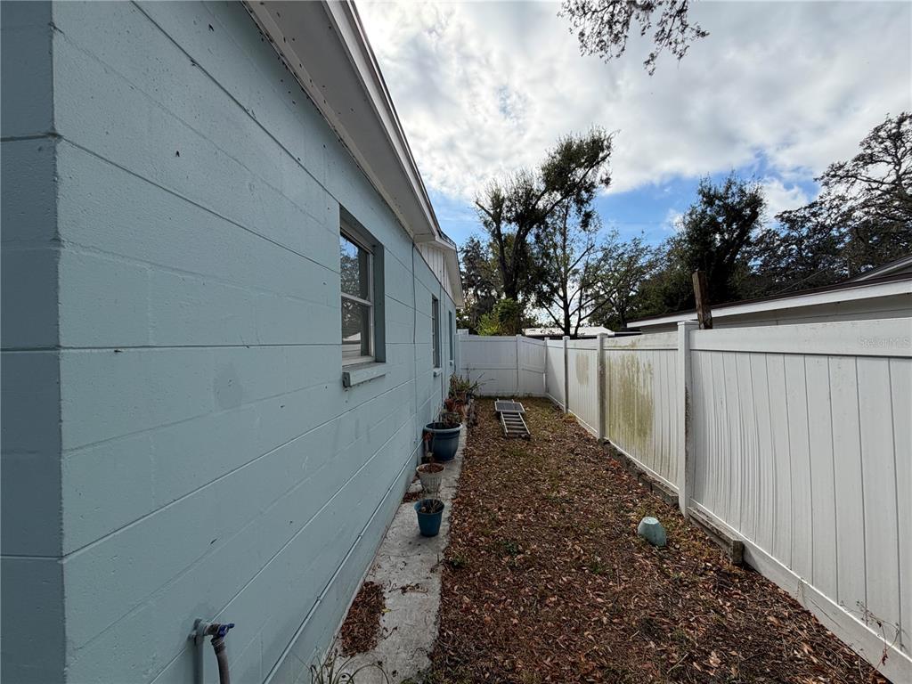 7016 Filbert Lane Temple Terrace, FL 33637 - Photo 26 of 31 a view of a backyard of the house