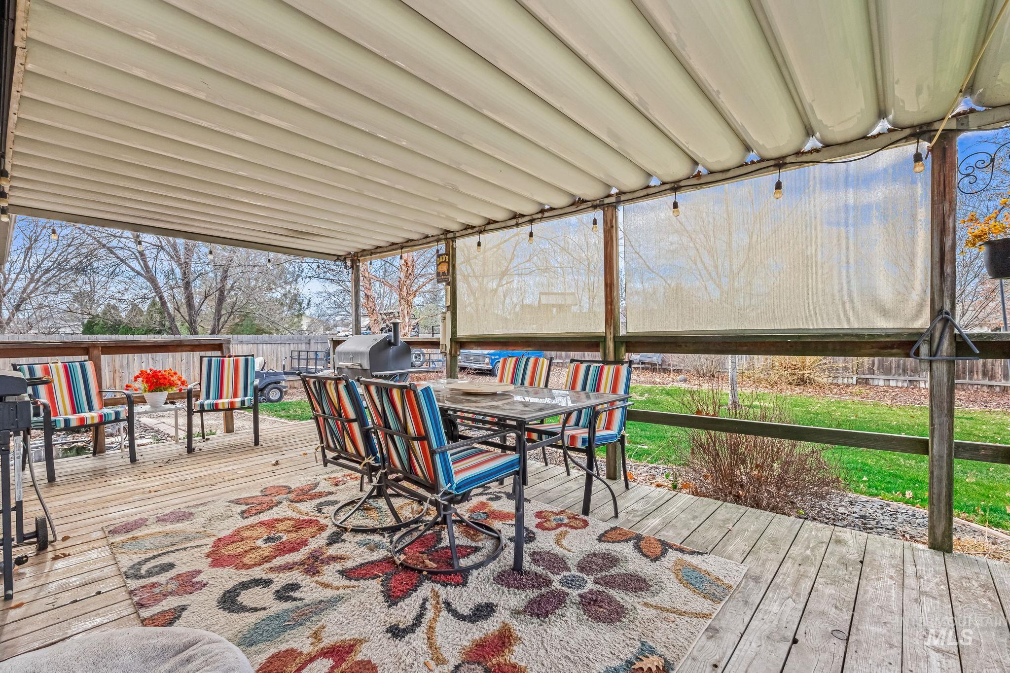 7650 West Colt Drive Boise, ID 83709 - Photo 20 of 30 Deck featuring outdoor dining space and area for grilling