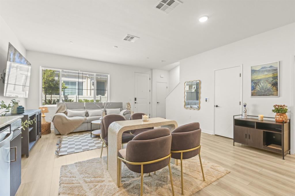35173 Grove Trail Fallbrook, CA 92028 - Photo 11 of 30 a living room with furniture a large window and a rug