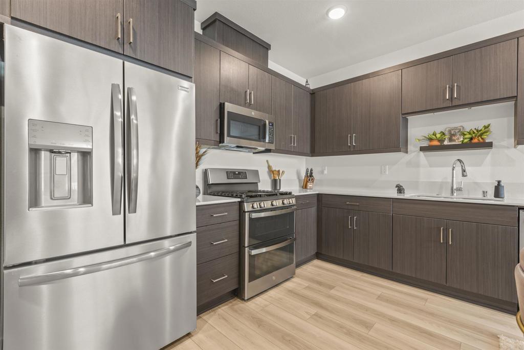 35173 Grove Trail Fallbrook, CA 92028 - Photo 14 of 30 a kitchen with stainless steel appliances granite countertop a refrigerator and a sink
