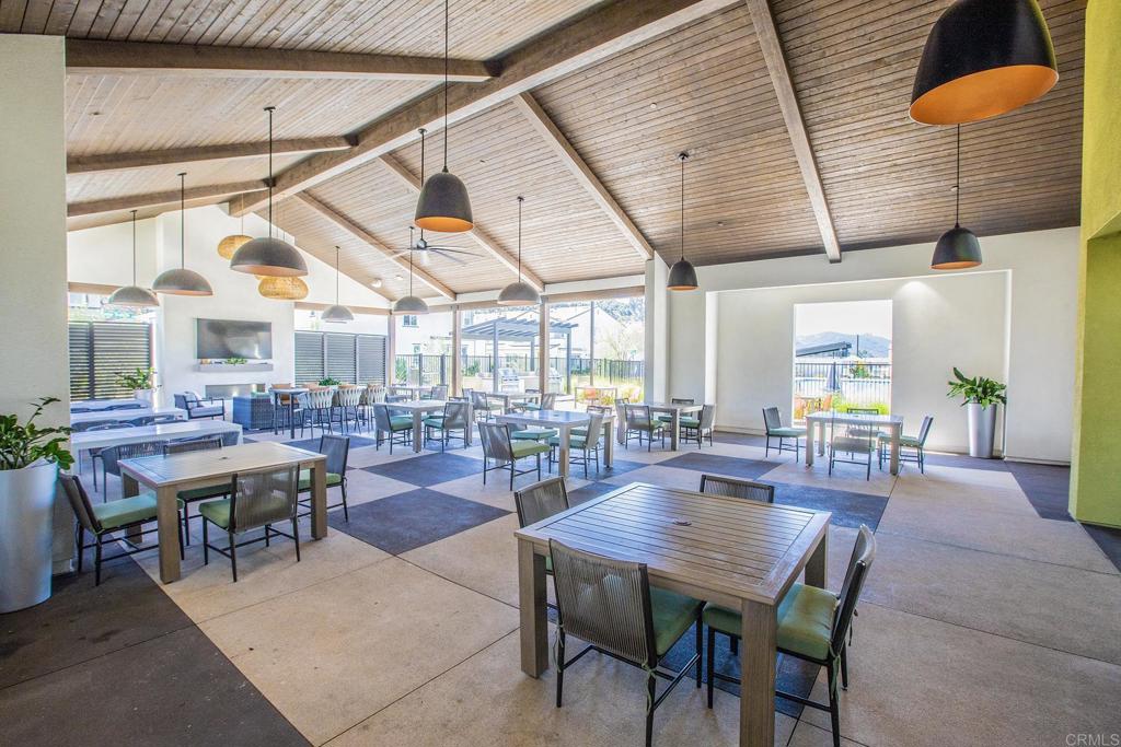35173 Grove Trail Fallbrook, CA 92028 - Photo 27 of 30 a outdoor space with lots of tables a chair and a potted plant