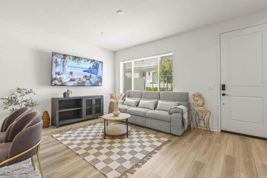 35173 Grove Trail Fallbrook, CA 92028 - Photo 7 of 30 a living room with furniture a couch and a table