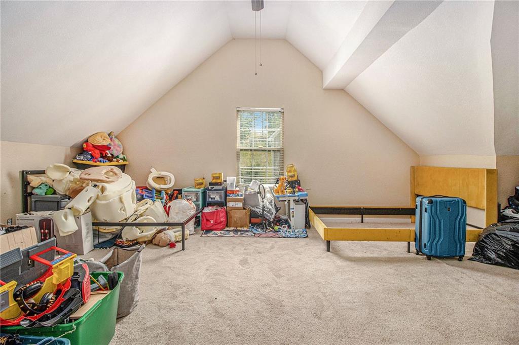 474 Boxelder Road Atlanta, GA 30349 - Photo 23 of 25 a view of gym equipment with clothes and shoes