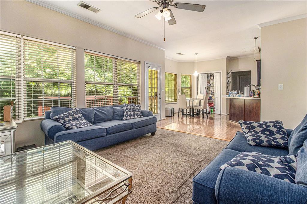 474 Boxelder Road Atlanta, GA 30349 - Photo 10 of 25 a living room with furniture and a large window