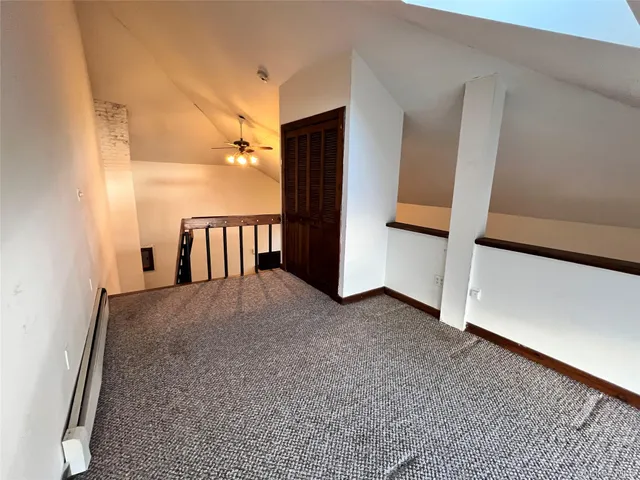 a view of a hall with an empty room